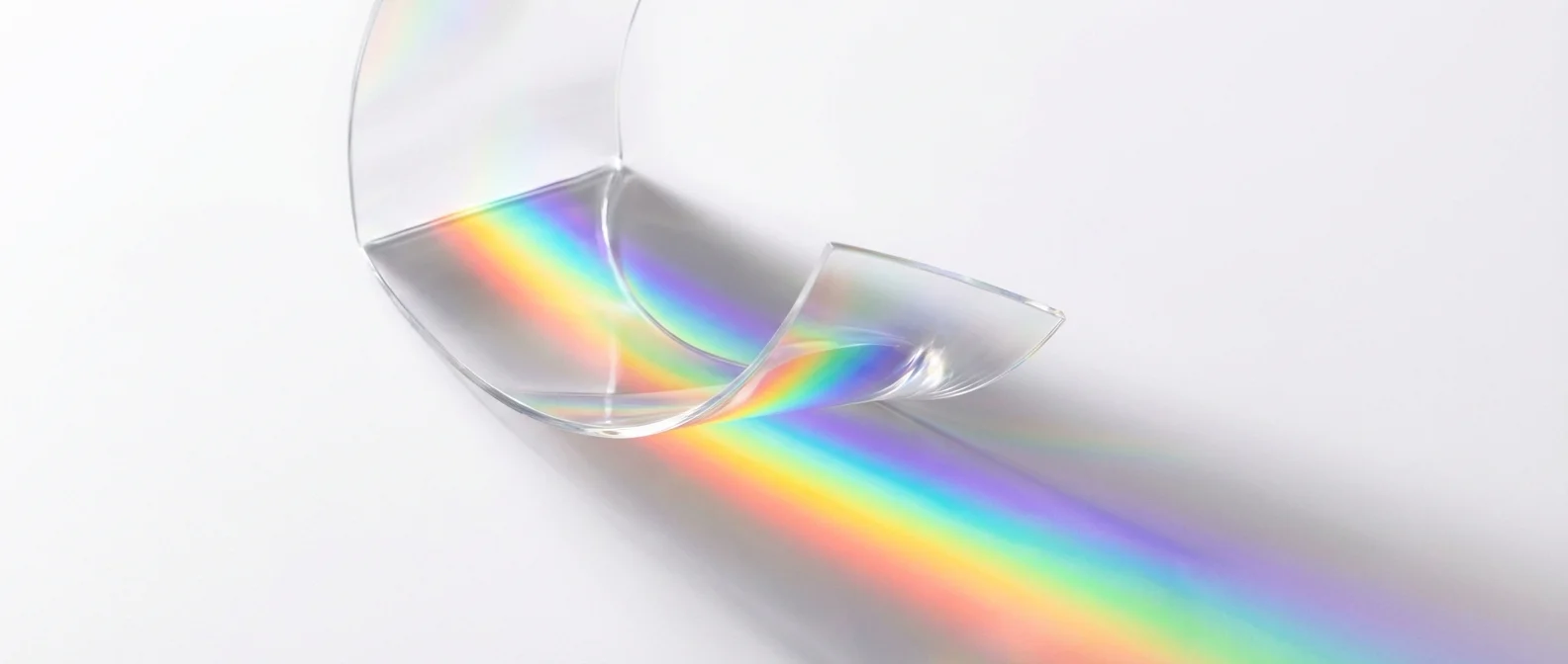 Revolutionary glass-plastic hybrid material showing transparency and flexibility properties in laboratory testing
