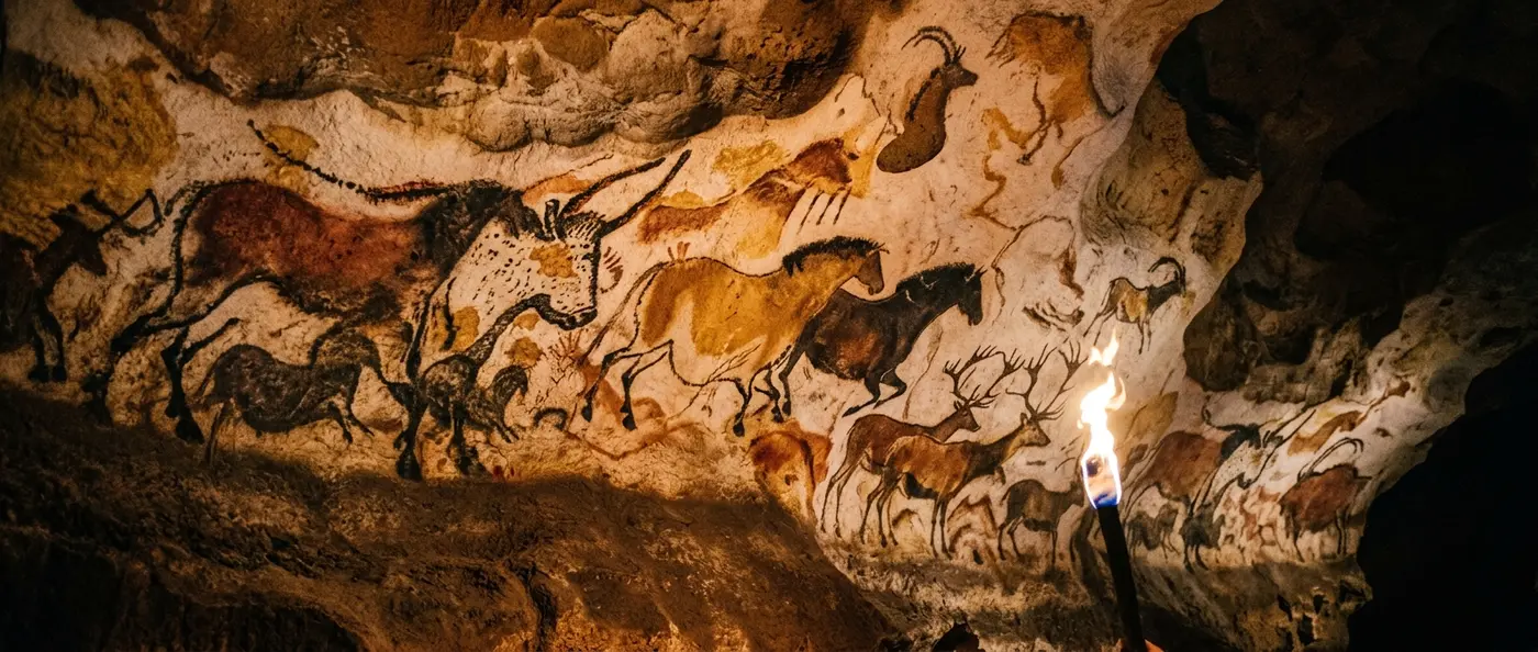 Ancient cave paintings showing sophisticated artistic techniques from 25,000 years ago